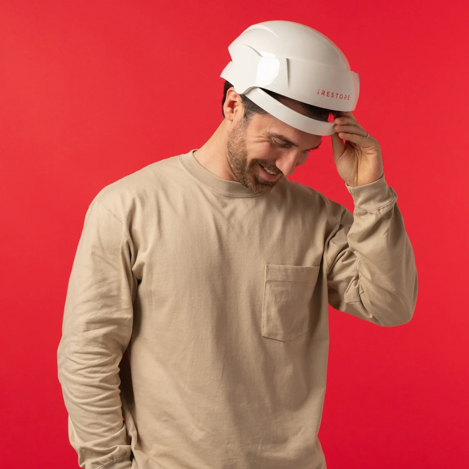 Image of a middle aged man wearing the Essential hair device.