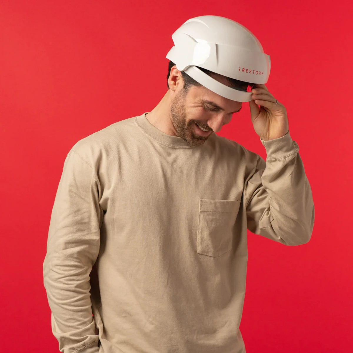 Image of a middle aged man wearing the Essential hair device.