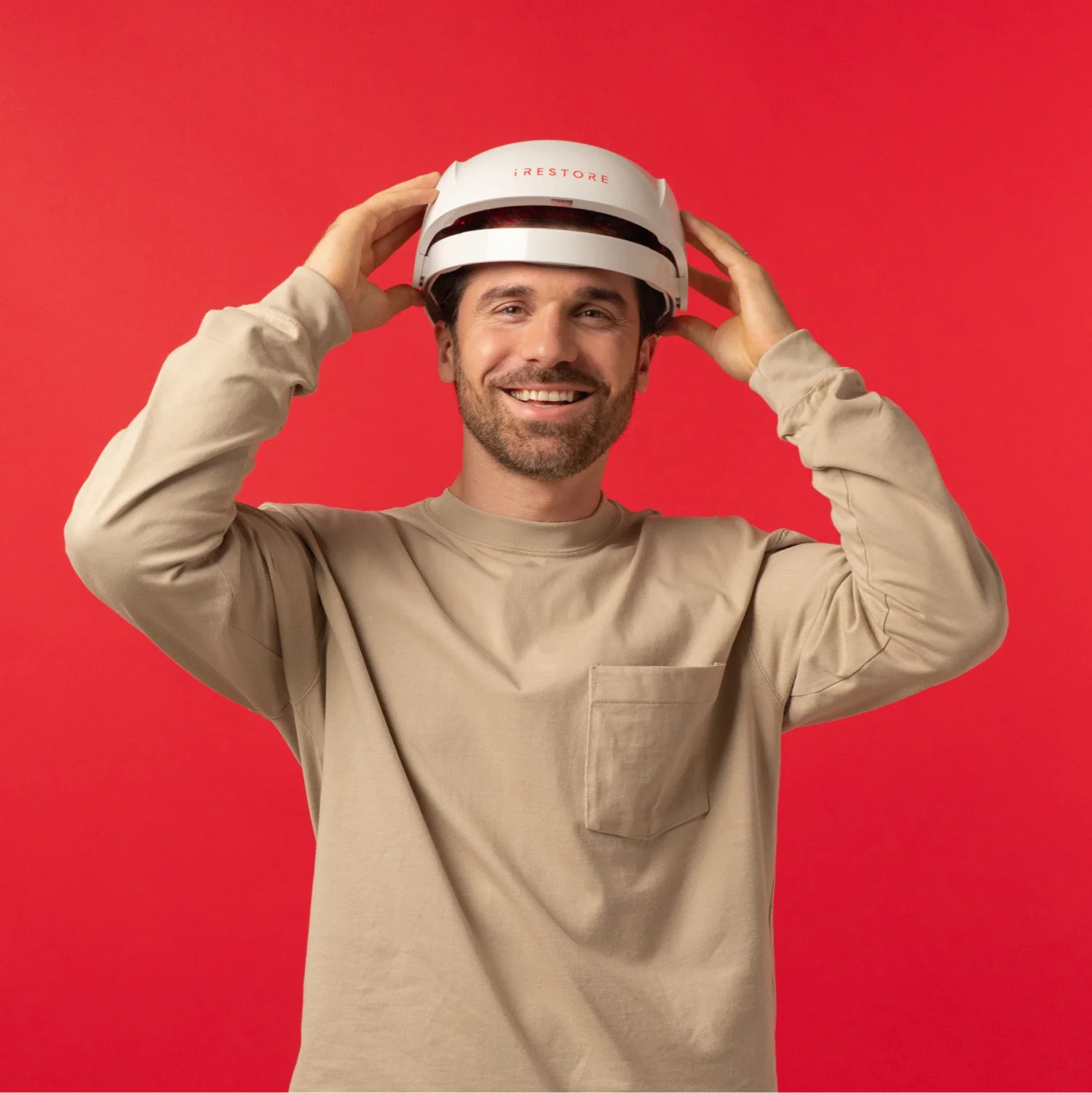 Image of a middle aged man wearing the Essential hair device.