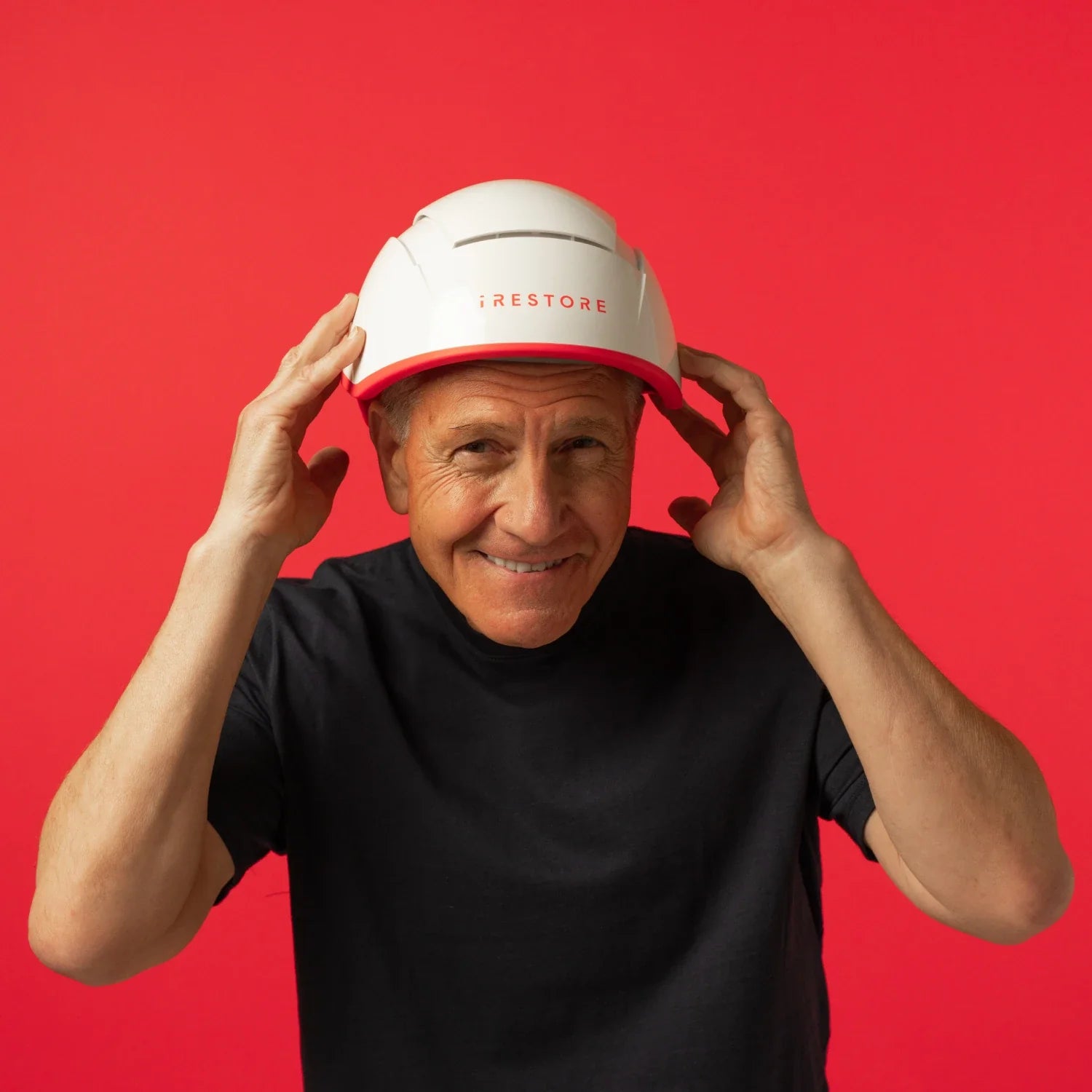 Image of a mature man wearing the Professional hair device.