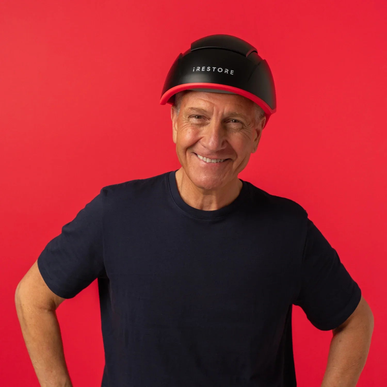 Image of a mature man wearing the Elite hair device.